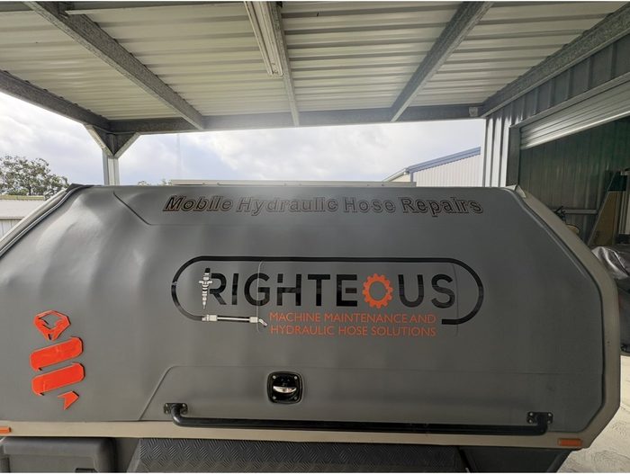 Righteous machine maintenance canopy signage