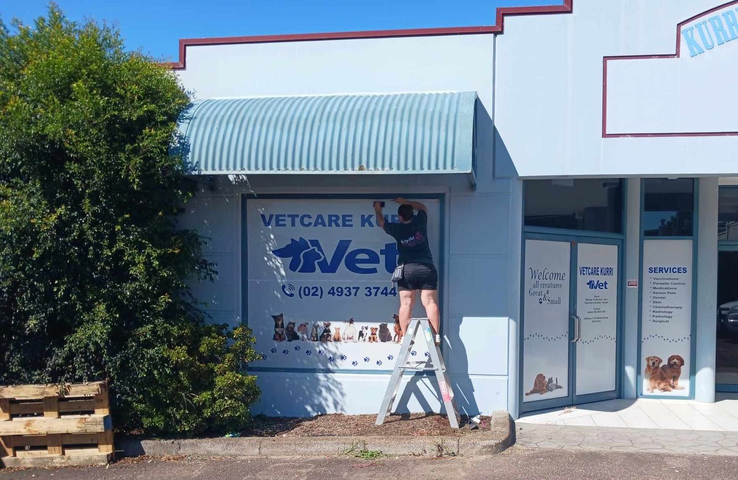 CK Signcoe installing shopfront signage